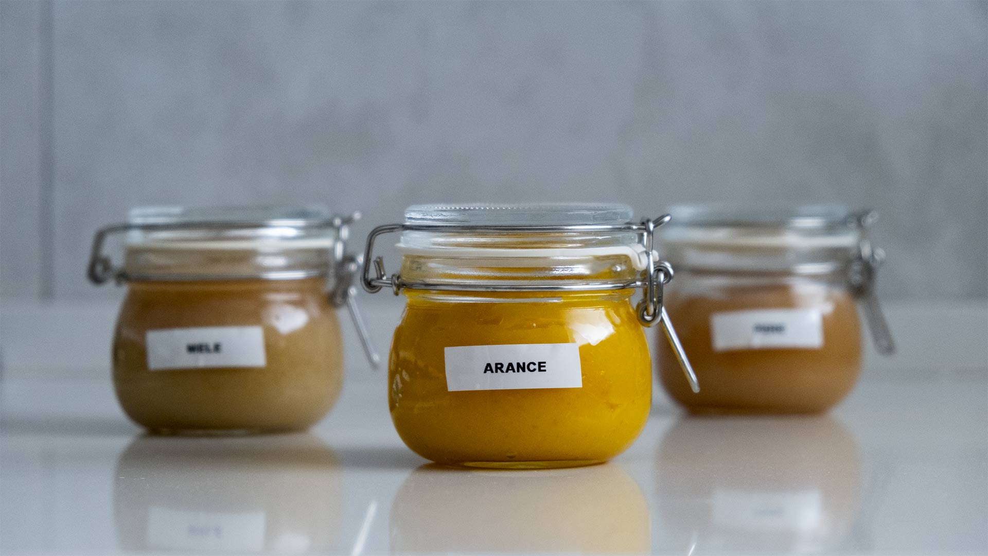 Marmellata di arance, confettura di pere e di mele, sottovuoto